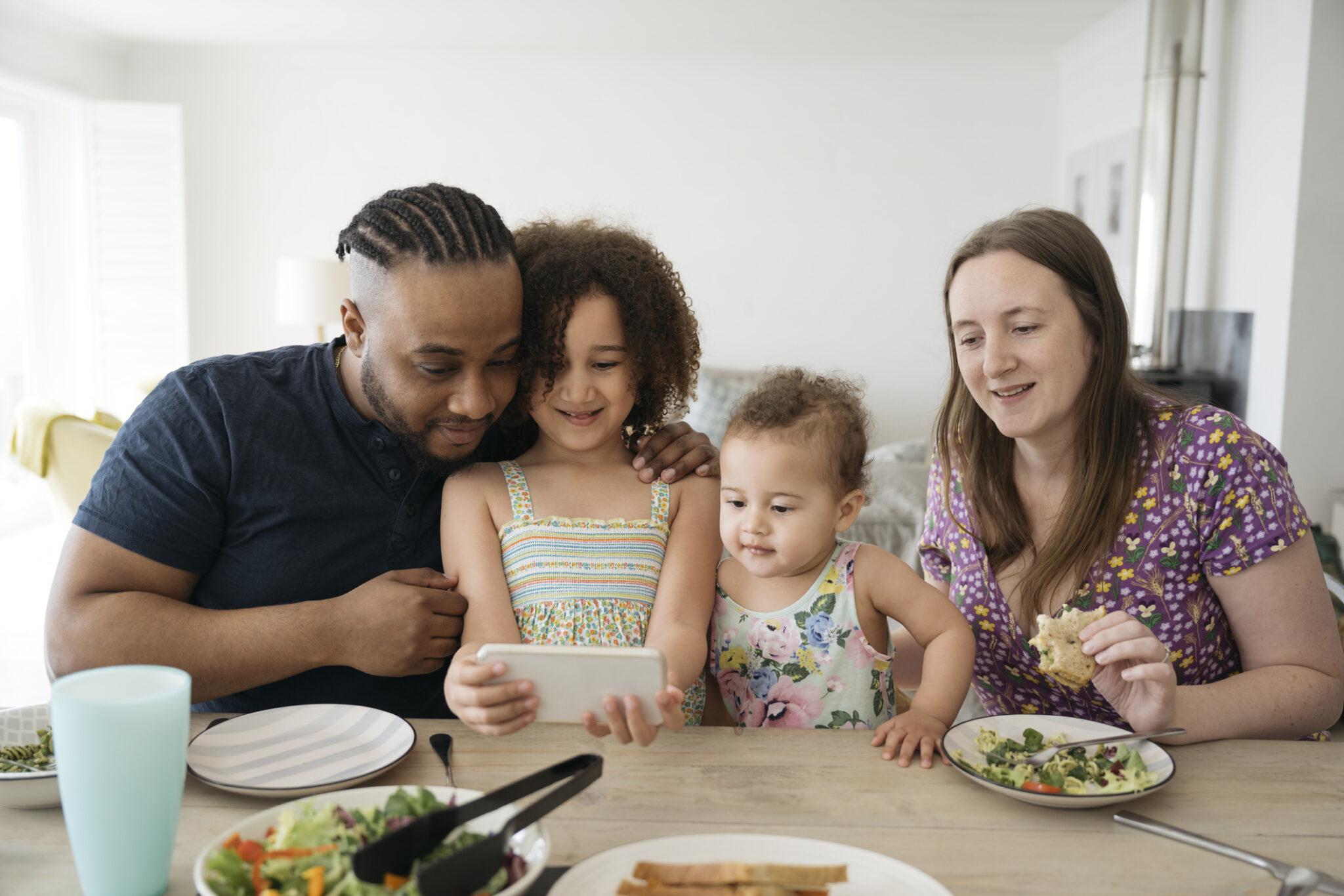 Young family at the dinner table