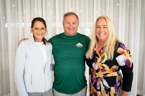 Andrea and Sean Napolitano of A-1 Roofing & Construction with Looking Upwards’ Executive Director, Carrie Miranda